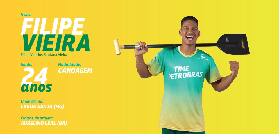 Caroline Almeida posing for the photo wearing a T-shirt with the words 'Petrobras Team' stamped on it.