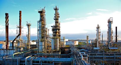 Industrial view of Riograndense Oil Refinery, a pioneer in biorefining in Brazil, with pipes and processing towers.