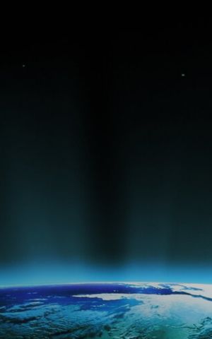 Digital illustration of Earth seen from space, with blue light beams rising from the planet's surface against a dark starry sky.