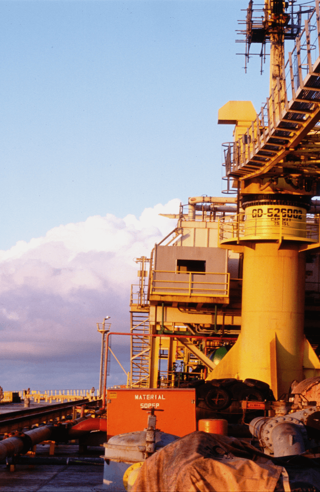 Daytime photograph of a Petrobras offshore platform.