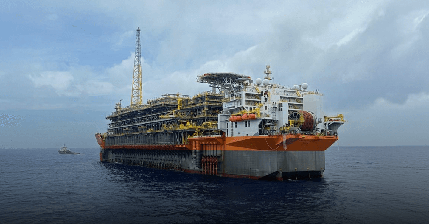 Daytime photograph of the FPSO Almirante Tamandaré oil platform at sea.