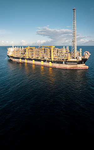 Image of the FPSO Marechal Duque de Caxias operating at sea under a clear sky.